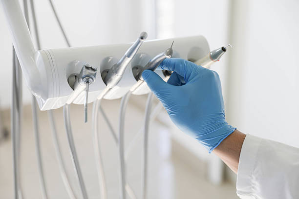 Professional Tooth Extraction technician working in Texanna, OK